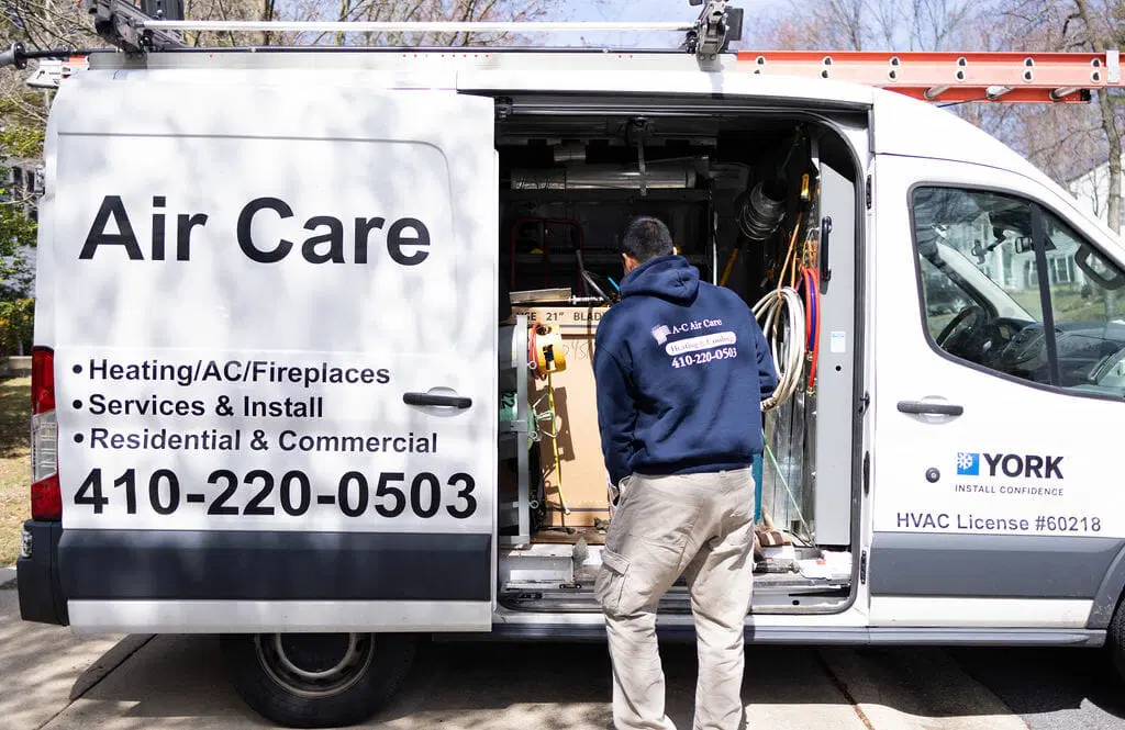 AirCare HVAC service team working on air conditioning system