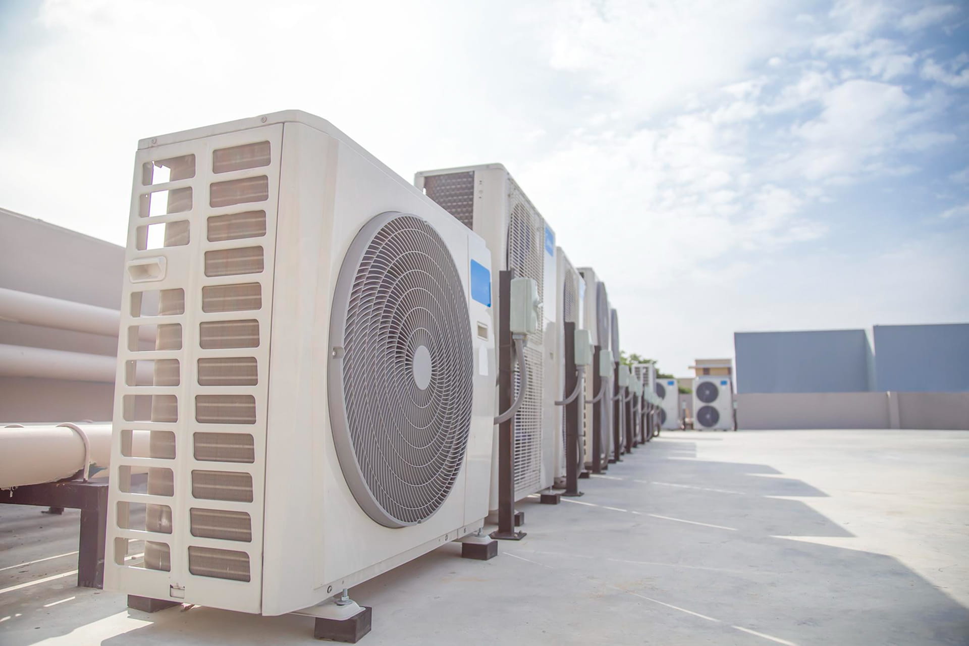 commercial rooftop HVAC air conditioning condenser units large building cooling system